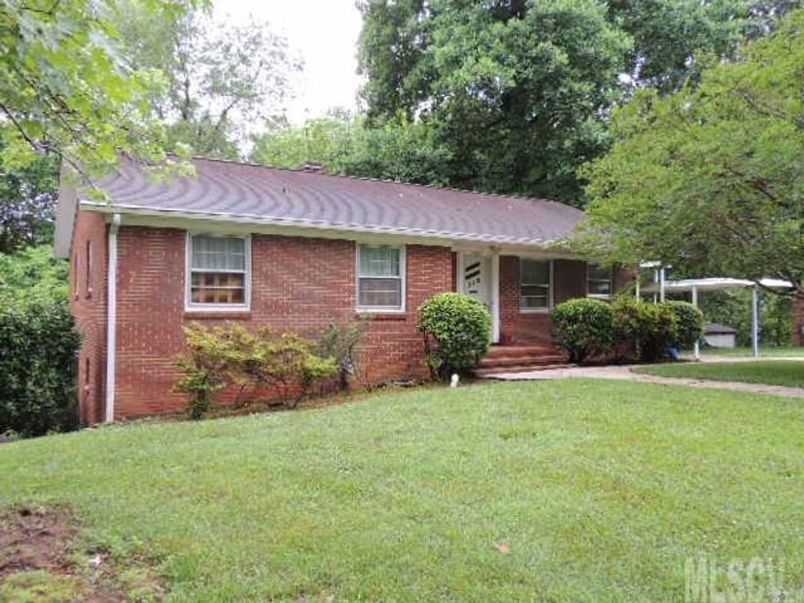 Very well maintained, all brick home in great location. The home features beautiful hardwood floors in living areas and all 3 bedrooms. Gas fireplace and built-ins in living room. Lots of windows let in natural light. Eat in kitchen with lots of cabinets and a pantry. Full basement with a room for office or crafts, a work area, and lots of room for storage. There is also a garage door and a walk out door in basement. Two driveways and two carports offer plenty of parking. Be sure and give this home a look!