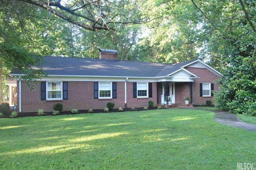 Beautiful newly renovated Crouch Built brick ranch with a 1950's feel in a great location near Downtown Hickory, YMCA, Catawba Country Club and more. This Home was just recently remodeled by Steele's Construction and is like new inside and out. One level living with large kitchen and dining area, playroom, foyer and large living room. Extra large bedrooms with completely new renovated bathrooms. Master bath has new double vanities and walk in tile shower. French door walk in china cabinets in dining area. Hall bath has new double vanities and new tile shower. Home features hardwood floor throughout, custom kitchen cabinets, pantry, appliances and bar island with custom wood counter top. Exterior of home features a completely new multilevel deck, screened in porch, with a 2 car carport and lots area for the kids to play. Must see!