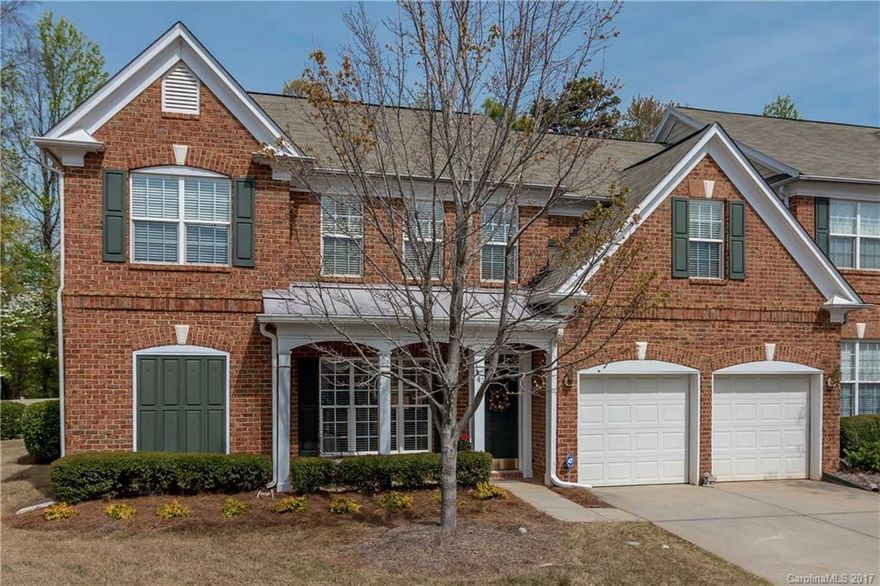 Lovely all brick corner unit- original owner barely used 2nd floor. Looks like new! 2 Sty Foyer, HWs, newer carpet, deep trey ceiling in DR, vaulted clg in Great rm. Raised panel kitchen cabs, solid surface ctops, 2pc CM. Huge 1st flr MBR w/ deep trey clg. Enormous BRs on 2nd flr & spacious loft. Great walk in storage. 2" blinds thruout. 1st flr AC new-2013. Private enclosed rear tiled patio, backing to trees! Close to Arboretum, HWY 74, Shops, Movies, Restaurants. Highly rated schools.