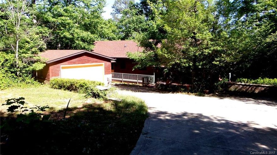 Find your Mountain Retreat here on Lake Tillery. This waterfront home is located in Windemere Pointe and offers a very private setting with a wooded lot. Owner currently has a waterfront lease with Duke Energy which would allow a buyer to construct a new boathouse and dock at the shoreline. The white cypress interior walls have a cedar smell which really gives you a mountain feel in this home. There is an large open loft and the basement offers a tremendous opportunity. The Tillery Retreat !