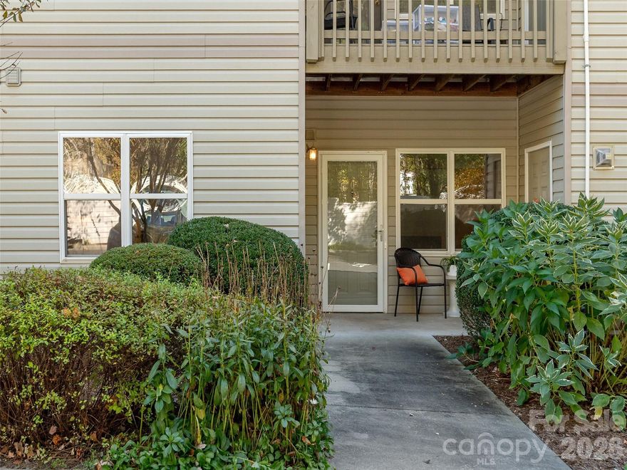 Welcome to Carlyle Condominiums, a quiet community conveniently located in South Asheville. Charming two bed, two bath condo is in immaculate condition and move in ready. Primary bedroom has ensuite bathroom. New higher end LVP flooring throughout. Gas log fireplace in living room. Guest room and guest bath are both ample size. New paint and easy to enter no-step entryway with parking right out the front door. Brand new HVAC system installed in June 2025 and a new disposal installed in July 2025. Come enjoy one level living today.