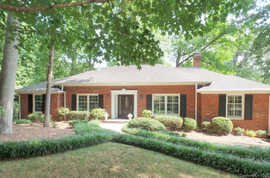 Picture perfect brick ranch w/ awesome finished lower level in Mountainbrook. This sought-after Waters floorplan offers elegant formals, large den w/ FP, awesome heated & cooled sunroom and updated kitch. w/ awesome cabinets and counter space. Oversized main level master w/ walk-in closet. The lower level offers a huge greatroom w/ fireplace, custom built-in bar and 2 huge bedrooms with adjacent full bath. Rare flat / level backyard for Mountainbrook! Walk to swim and tennis club & playground!