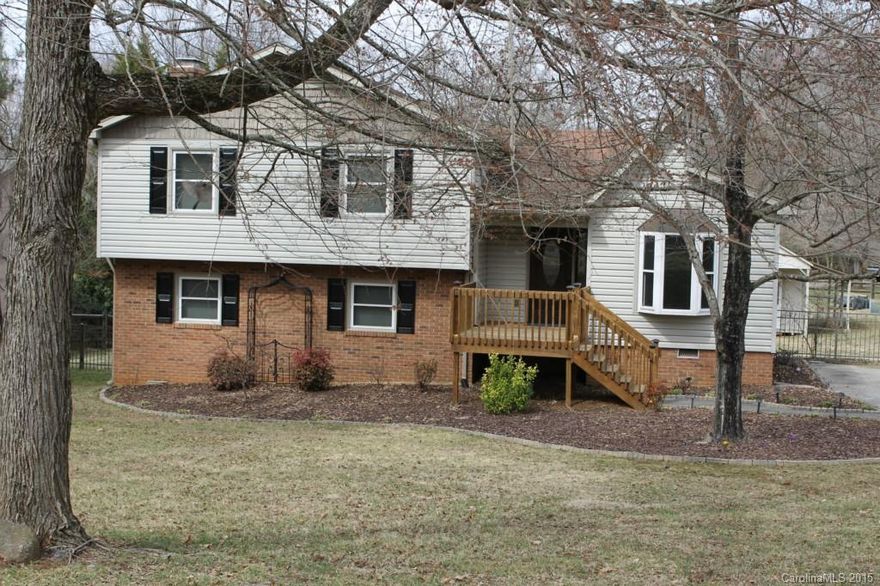 Rustic Feel in desirable Harrisburg! Fresh paint, and updated fixtures throughout. Beautiful hardwood floors, and new carpeting. Kitchen features new granite countertops, new stove top with grill feature, new wall oven and microwave. Tankless Gas Water Heater.  Large fenced yard with 16x24 workshop with small garage/utility door for loading machinery/small vehicles. Acreage to be verified. Call agent for details.