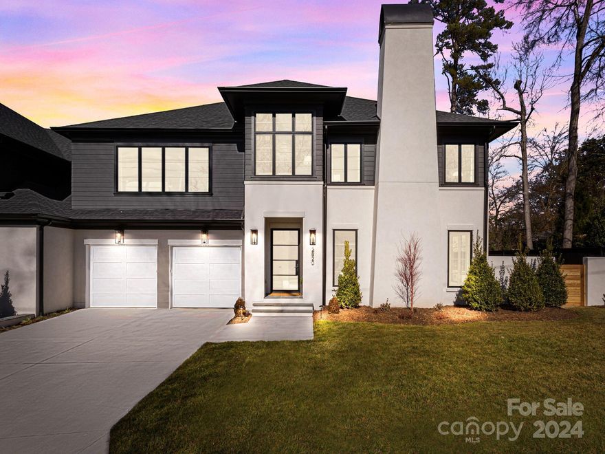 Welcome home to this brand new construction luxury duet near Freedom Park! Built by McCormick Custom in 2023, this home has it all. The oversized steel door welcomes you right into this open concept floor plan. Featuring a primary on the main level, with an oversized primary bathroom and closet (with laundry hookup), as well as equipped with an elevator for access to both floors. Professional grade SubZero/Wolf appliances, a custom plaster range hood, beautiful custom cabinetry with quartz countertops make the kitchen a chef and entertainer's dream. The second floor features a welcoming bonus room with wet bar, a dedicated office and three additional bedroom suites. Exterior features include private, fenced-in side yard, in-ground irrigation and landscape lighting. A short distance to all that Freedom Park, Park Road Shopping Center and Selwyn Ave have to offer!