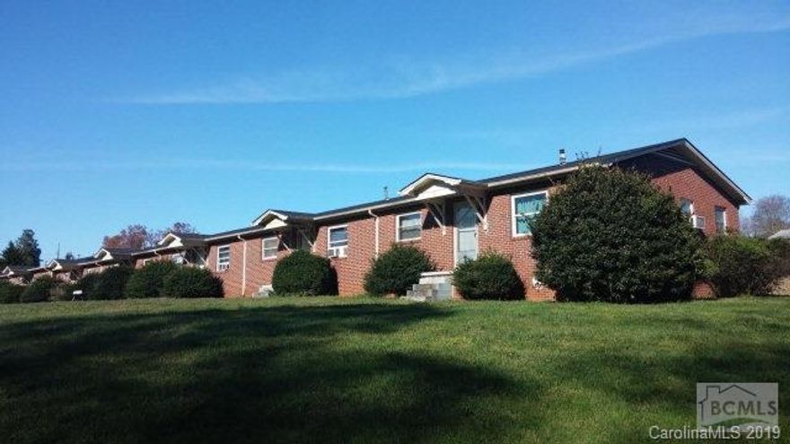 Great investment property, brick building with new 30 year Architecture roof in 2013. Building consist of 5-3 BR apartments an 5-2 BR apartments. 3 BR rent for $450/mo an 2 BR rent for $400/mo. Great rental history, owner provides water, sewer, dumpster an lawn care. Avg occupancy 90%. Seller has realtor interest. Call listing agent for more details