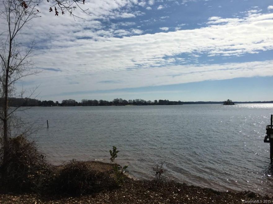 Fantastic views of the lake. Gentle slope of land to the water. Excellent location to own .76 acres on the lake. Home could be a fixer upper or bring your builder. Must see.
