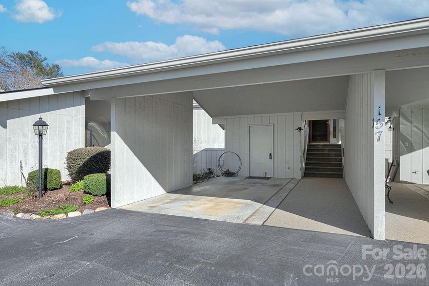 This Glen Cannon condo offers comfortable mountain living with beautiful views in a convenient Pisgah Forest location. The unit features single-level living with 2 bedrooms and 2 baths, an open floor plan with a fireplace in the living area, and an oversized screened-in porch perfect for enjoying the peaceful surroundings.

Extensively updated, the home includes new flooring, kitchen appliances, interior paint, and numerous additional improvements throughout. Major upgrades provide added value and peace of mind, including a brand-new roof installed this past fall, along with new carport and front stair carpeting and other thoughtful enhancements.

An attached carport provides covered parking with dedicated storage. The additional space in the basement adds valuable flexibility with finished living space, a bathroom, and storage, ideal for guests, hobbies, or a home office. Large windows bring in natural light and highlight the scenic setting.

Located just minutes from Brevard, outdoor recreation, dining, and all that Transylvania County has to offer, this move-in ready condo blends modern updates, low-maintenance living, and mountain charm—perfect as a primary residence, second home, or lock-and-leave retreat.