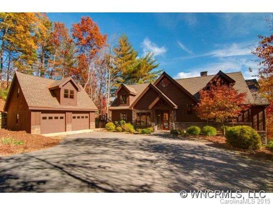 Beautiful home on 2 lake lots w/ cascading mountain stream & waterfall crossing the lots & flowing into the lake at the dock. Large open & covered decks view the lake & the stream. Wonderful escape or retirement home w/ great fishing, nearby hiking along Toxaway River & boating on two lakes. Spacious home provides great accommodations for multiple family members or guests nestled in a lush forest. $12,500 credit towards golf club membership.