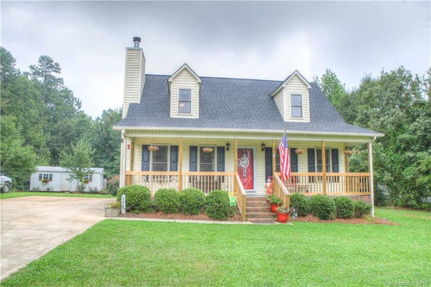Welcome to this inviting home with a rocking chair front porch located in a peaceful country setting. Wonderful upgrades include new kitchen countertops, laminate wood flooring and new vanities in both bathrooms. Every room has been freshly painted. New 24x24 back deck, roof replaced in 2016, and new HVAC with 10 year transferable warranty! This house is immaculate, move-in ready and ready for you to call home. No HOA and a 12x24 storage building on a 1.18 acre lot. This home will not last long!