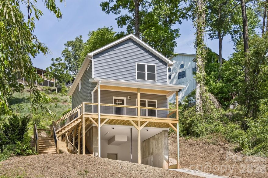 Come check out this New Construction in the heart of Biltmore Area with an incredible floor plan. This BRAND new home offers 3 bedrooms, 2 1/2 bathrooms plus an open concept living room, kitchen, dining . When you walk in, you'll find high end finishes such as granite counters, stainless appliances, LVP flooring throughout and tile in the bathrooms. Nine foot ceilings downstairs and eight foot ceilings upstairs. The large covered front porch is perfect for relaxing. Back deck is located just off the kitchen, with a walk way to front porch. Very convenient to downtown Asheville, Biltmore area. Shopping just around corner.  Covered parking for 2 vehicles plus 3 additional spots on driveway. Close to the Tobacco Barn Antiques