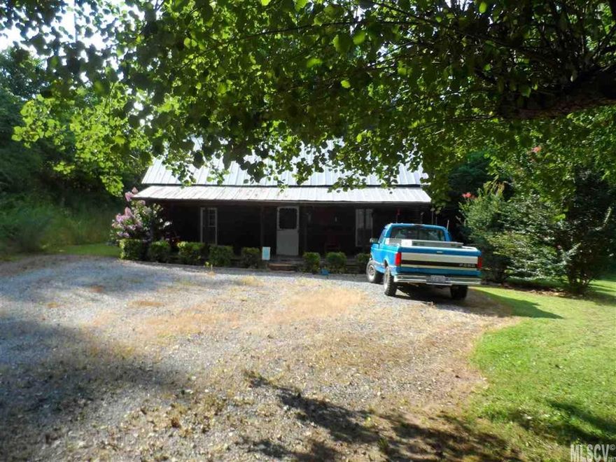 4.29 Acres land, A charming 1900 farm house, and a great flowing creek, three large bedrooms, one bath, Kitchen, Dinning room, and living room with fireplace. Several out buildings and a large garden spot. Central heat and Air. Country living at it's best. Ready to move into. Call for a private showing.