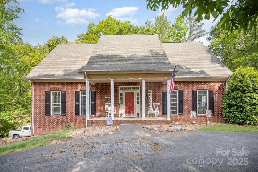 Peaceful Country Living with Bonus Lot – Just Minutes from Downtown Waxhaw!
If you're seeking the serenity of country living with room to spread out, yet still want to be close to everything, this unique property is a must-see! Located just south of Waxhaw and minutes from historic downtown, this spacious home offers a rare opportunity to enjoy 2.73 acres of land across two parcels—Lot #1 (1.71 acres) and Lot #2 (1.02 acres)—both included in the sale.
The main home features a primary suite on the main floor with an en-suite bath, plus a second main-level bedroom that includes a private sitting area and direct access to a bathroom with a walk-in shower—ideal for guests or multigenerational living. Upstairs, you'll find a bright loft space and three additional bedrooms sharing a full bath, offering flexibility for family, home office, or hobbies. A 618 sq ft basement room with a private entrance and fully updated bathroom. Don’t miss your chance to own this one-of-a-kind property!