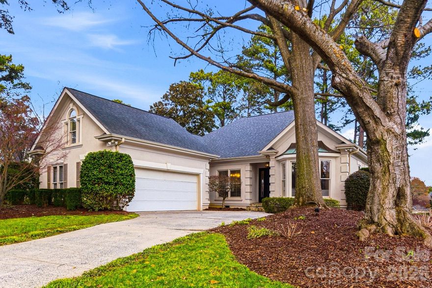 Beautifully updated right-size home in The Peninsula offering refined main level living in one of the area’s most desirable golf and lake communities. The open, light-filled layout is thoughtfully designed for both everyday comfort and elegant entertaining, featuring an updated kitchen, with inviting open living spaces, that enhance gatherings with family and friends.

The primary suite serves as a private retreat with vaulted ceilings, abundant natural light, direct access to the deck, and a fully renovated spa inspired bath completed in 2024. Two additional guest bedrooms are conveniently located on the main level, offering flexibility and ease of living. Upstairs, a spacious third bedroom or bonus suite above the garage includes a private en-suite and ample storage, ideal for guests, recreation, or a secluded office space.

Outdoor living is equally inviting, with a deck overlooking a serene, tree-filled backyard that provides both privacy and a peaceful setting. Plantation shutters throughout and fresh interior paint add timeless sophistication.

Significant recent improvements include a primary bath renovation, updated HVAC and furnace systems (main 2017, upper 2024), electrical panel upgrade in January 2024, new gutters in 2024, new carpet in the primary closet, and a new dining room light fixture in 2026, ensuring the home is truly move-in ready.

Located just minutes from The Peninsula Club and The Peninsula Yacht Club, this exceptional property offers the opportunity to fully embrace The Peninsula’s coveted lifestyle!