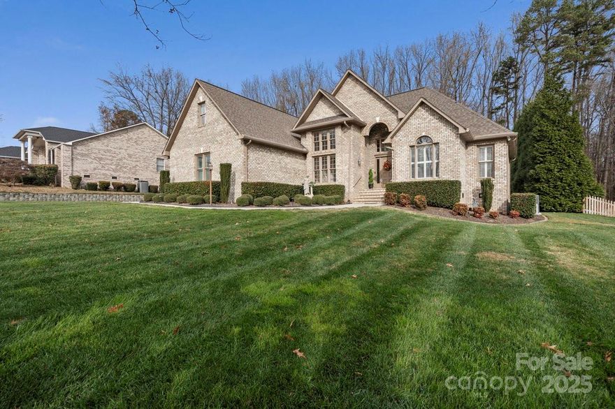 Welcome to this stunning 3BR, 2BA brick home in the desirable Stone Ridge community, where charm and comfort come together effortlessly. Gorgeous brickwork, spacious windows, and grand entrances set the tone as you step inside. Enjoy a beautiful dining room, a bright breakfast area, and generous living spaces perfect for gatherings. The primary suite features its own cozy sitting area with a fireplace—your personal retreat for reading and relaxing. Outdoor living shines on the expansive deck with built-in grill and gas fireplace.  This home is enhanced by full-home and outdoor audio for your enjoyment. Car lovers will appreciate the attached 2-car garage with installed finished floors plus a heated, detached 3-car garage and matching workshop. Sitting on .84-acre lot, this home is truly ready to welcome you.