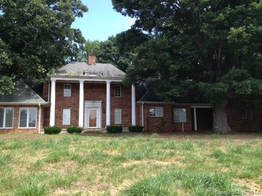 WOW….ONE OF A KIND HOME & SETTING!!  VERY UNIQUE HOME ON 18.4 ACRES!!  This home was original built in 1910 and offers 4 bedrooms, 2.5 baths, a living room with fireplace, a formal dining room, kitchen with breakfast area, a sunroom, an unfinished basement and much more!!  Has hardwood floors throughout!!  BRING OFFERS!!