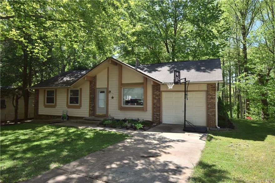 Cute as a button home in convenient Mount Carmel location,  move in ready and a great starter, 3 BR, nice backyard-great for gardening or fencing in for pets and/or kids, AHS Home Warranty, garage, heat pump, nice area of homes, Asheville address without city taxes.
