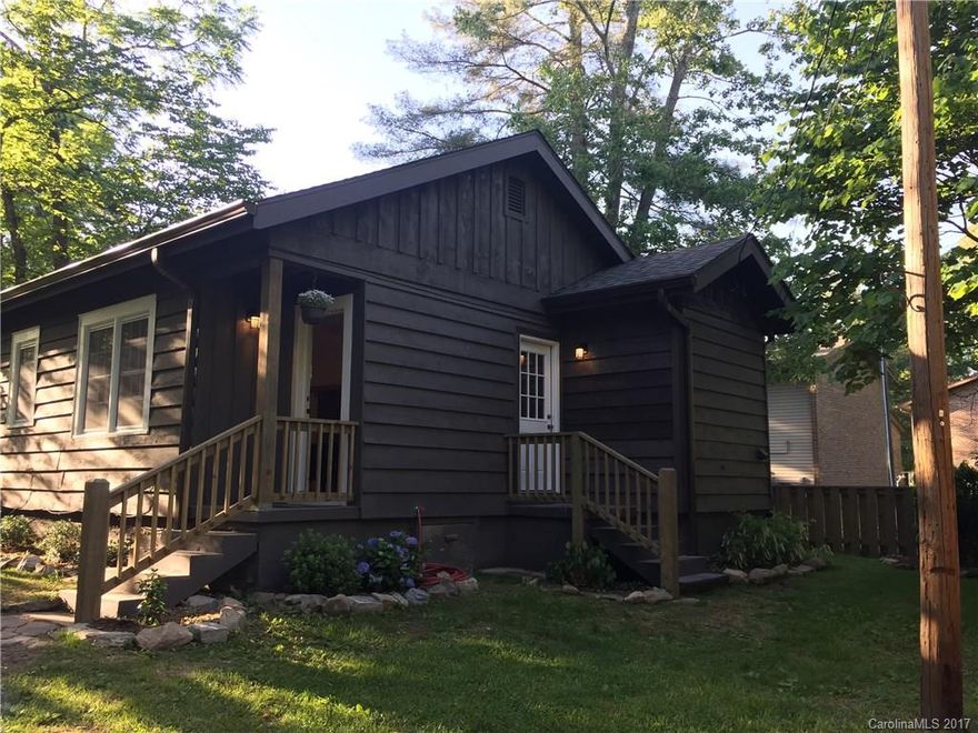 Great bungalow in downtown Brevard!  Updated 2 bedroom, 1 bath house with re-finished hardwood floors, laundry room, custom wood counters in kitchen, walk-in pantry, new stainless appliances, and new windows.  Partially fenced in yard, with privacy and nice landscaping.  Fantastic location!  Walking distance to everything downtown.  Must see!  Has city water and sewer.