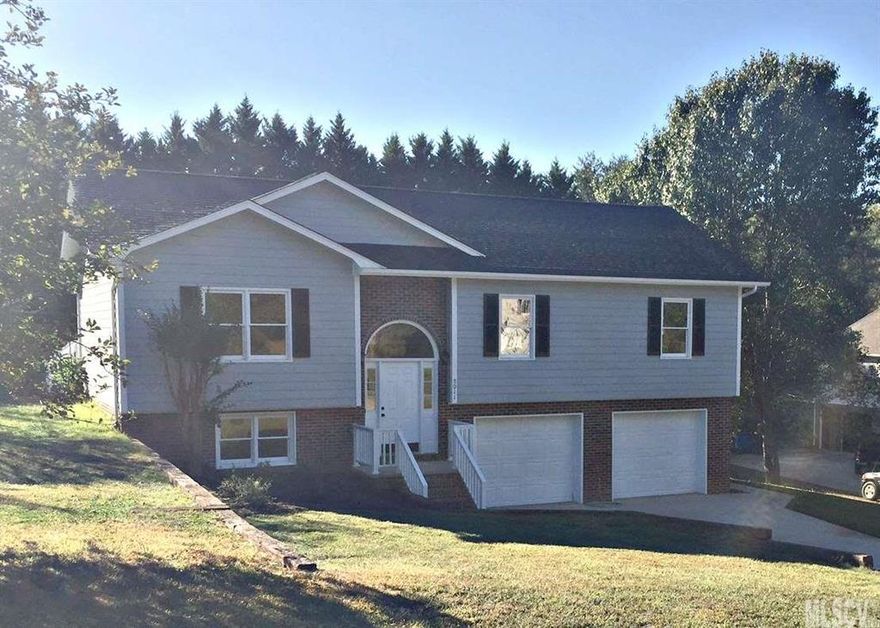 Updated split foyer home with 3 bedrooms and 2 bathrooms.