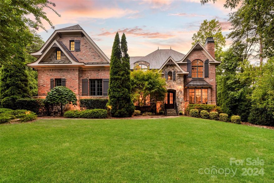 Escape the hustle and bustle in your own secluded retreat, where peace and tranquility abound on this sprawling 1.22-acre wooded lot set within the coveted Patrick's Purchase neighborhood. Just steps to The Peninsula Golf Club, this custom-built Artisan home offers unparalleled privacy and serenity, surrounded by mature trees and lush greenery. Thoughtfully designed and meticulously crafted, the residence showcases quality construction and attention to detail throughout. Interior features include soaring ceilings, large kitchen w/double islands and walk-in pantry, den with fireplace, office with French doors, dual primary suites (upper boasts fireplace, massive walk-in closet, spa bath), dual laundry, mudroom. The backyard oasis creates the perfect backdrop for effortless entertaining or quiet relaxation with its stunning pool & spa, fireplace, and built-in grill while the expansive lot allows for future entertaining area or added living space! Roof 2021 - Upstairs HVAC 2022.