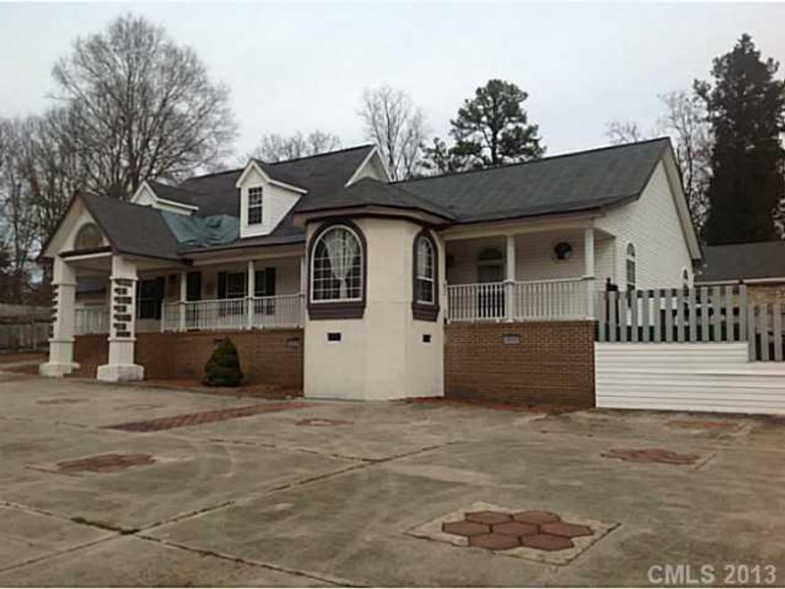 Sold as is. Home features an inside pool and a wet bar,  lots of room for entertainment. Must see.