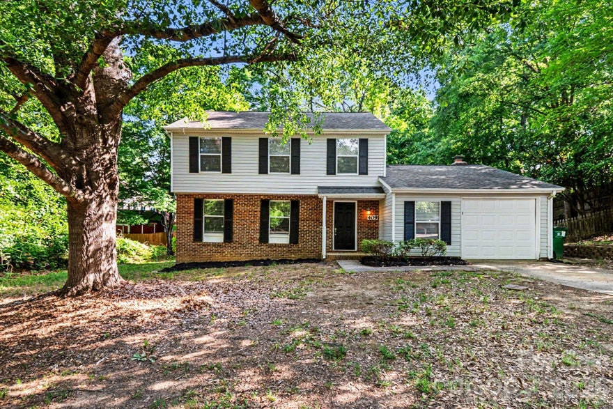 Welcome home to this move-in-ready 3-bedroom, 2.5-bathroom residence in a peaceful part of Charlotte. This home features a spacious open floor plan designed for a seamless flow throughout the main living areas, centered around an inviting living room fireplace that adds a touch of warmth and charm. The updated kitchen is a functional and stylish highlight, boasting sleek granite countertops and modern stainless-steel appliances. The location is standout, offering unparalleled convenience for a variety of lifestyles. You are perfectly situated near the major employment and shopping hub of Ballantyne and provide an easy commute via I-485. The property is also located close to Novant Health Pineville Hospital, the airport, and is just a short drive to the vibrant energy of Uptown. Schedule your private showing today!