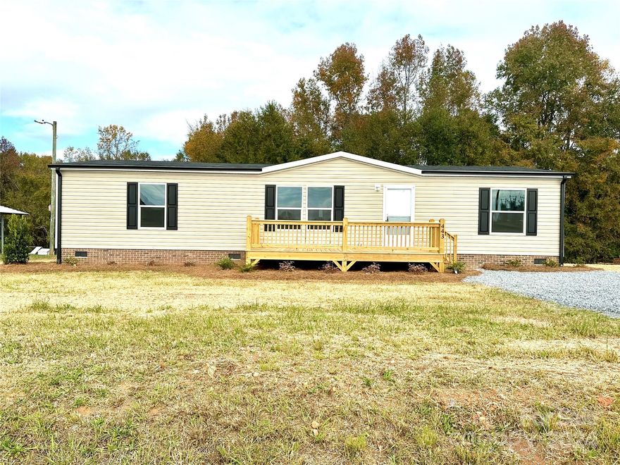 Discover your dream home in South Shelby! This brand new doublewide boasts nearly 1,500 sq ft of spacious living, featuring 3 comfortable bedrooms and 2 full baths. Nestled on a generous .6-acre lot, it offers the perfect blend of modern amenities, neutral colors and serene outdoor space. Enjoy an open floor plan, a stylish kitchen with lots of cabinets and a center island with breakfast bar, stainless steel appliances, and luxurious finishes throughout. Experience the ideal combination of comfort and convenience in this stunning home!