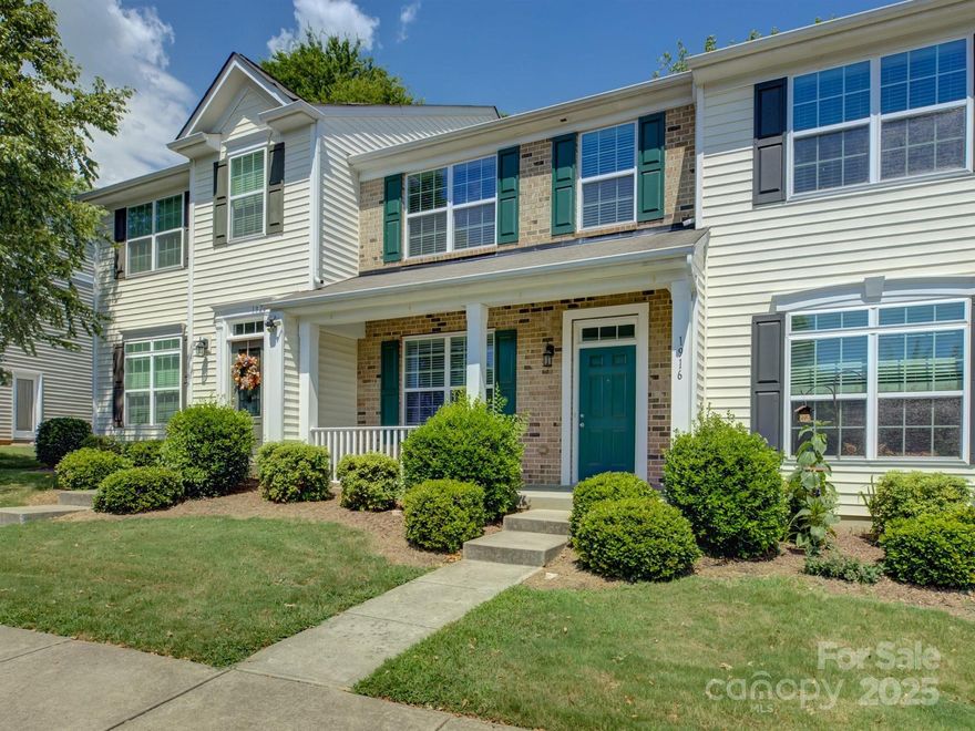 Welcome to 1916 Aston Mill—easy living in this move-in ready townhome. The main level features a spacious kitchen with a large island, pantry, and open flow into the living area. The front dining space easily doubles as a home office. Upstairs, both bedrooms are oversized with tray ceilings, ensuite baths, and generous closet space. Enjoy peaceful wooded views from the back patio and a front porch that's perfect for morning coffee. Neighborhood perks include a pool, dog park, water included, and lawn care. Two designated parking spots out front, plus additional visitor parking nearby. You're just minutes from I-485, I-77, Charlotte Douglas Airport, Charlotte Premium Outlets, and plenty of dining options.