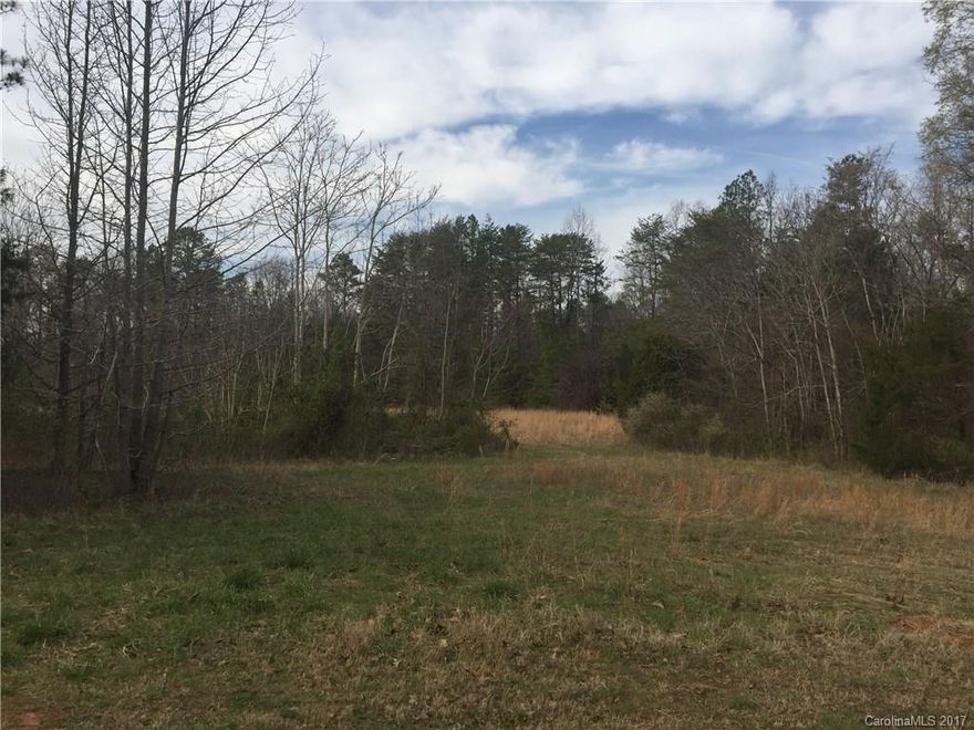 Come home to the country!  Beautiful lot with 3.45 AC of land just waiting for your custom home.  Quiet, country location in Clover School District.  Lots of privacy.  1800 square foot minimum to build.