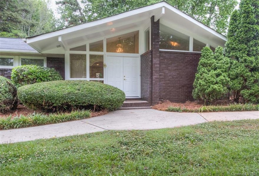 Full Brick ranch on a half acre corner lot. Very open floor plan. New sky light in living room. All smooth ceiling through out the house. Open kitchen, dining room and breakfast room combination with granite counter tops, SS appliances. Master bath with separate custom shower an bath. Huge master closet. New roof and heat pump within the last 6 years. The garage is over 800 SF, has double door but fits 4 cars. Fenced back yard. Great schools.