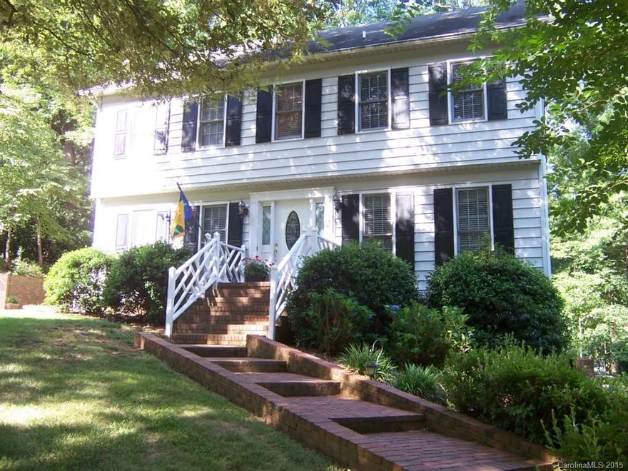 Come and enjoy all the spacious rooms in this home.  Formal living & dining rooms. Cozy great room with gas log fireplace.  Lots of windows. Kitchen with granite countertops. Breakfast room.  Master bedroom with large bathroom, double sinks.  Other 3 bedrooms upstairs are the perfect size.  Nice deck and a water fountain patio on the side of the house.  Garage downstairs and storage room.