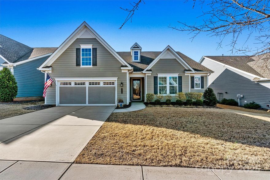 RARE FIND in Cresswind Charlotte! Popular HICKORY model offers 3 beds, 2.5 baths, Sunroom, custom 3-Season Rm, extended 2-car garage w/floored attic storage - all on ONE LEVEL! The open-concept layout features a Great Room with custom shiplap wall and floating shelves, recessed lighting & EVP flooring - NO CARPET! The chef’s Kitchen has quartz countertops, farmhouse sink, tile backsplash, under-cabinet lighting, SS appliances, gas cooktop, wall oven, and a custom Pantry. The Primary Suite offers a tray ceiling, large windows, a spa-like ensuite with dual vanities, a zero-entry oversized shower, makeup vanity & not one...but, TWO CUSTOM walk-in closets. The private, fenced rear yard is an oasis w/mature evergreens for privacy, and a gas stub for grilling. Enjoy low-maintenance living w/lawn care, security system & high-speed internet. Located in a vibrant 55+ community with top-tier amenities, including indoor/outdoor pools, sports courts, walking trails, and a 17,000+ sq ft clubhouse!
