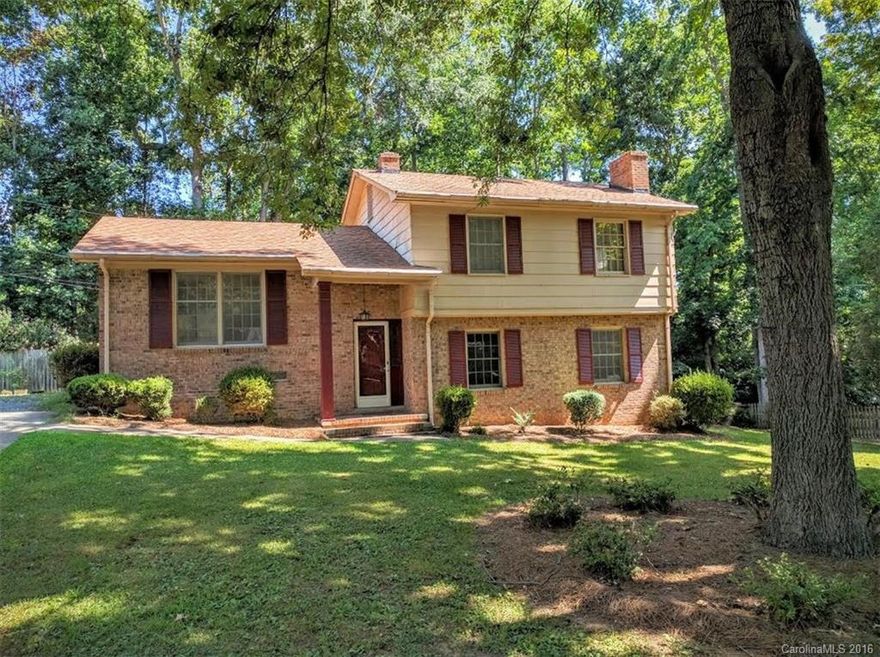 Welcome home to prime location on almost half an acre!! This home offers lots of space including a sunroom and cooled building out back that can serve as an office, workshop, or man-cave!  Kick back and relax on the back deck knowing that you're located in the county but reap the benefits of city water and a couple minutes trip to 77! They don't build them like they used to. Snag this one while you can!