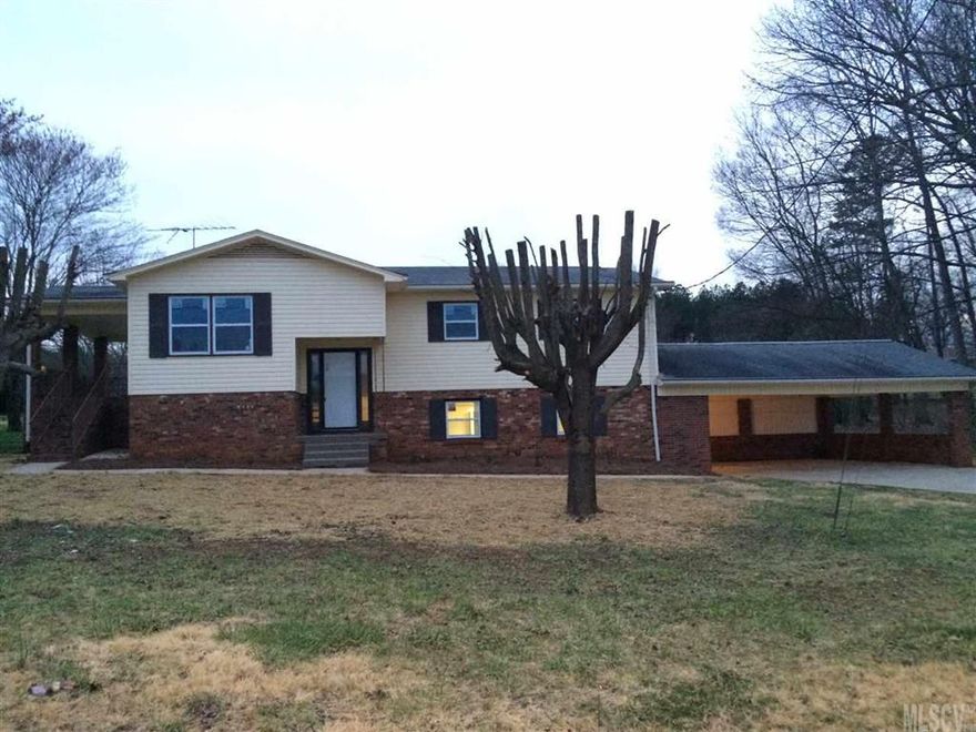 Great Starter Home! Ready To Be Moved In! 4 Bedrooms, 2 and 1/2 Baths w/Living Room and Den!! Lots of Updates. New Heat Pump. Half Bath has new vanity and new toilet. Full Bath has new toilet, new tub faucet. New Full Bath in Basement. All New Replacement Windows. New Carpet thru-out. Freshly Painted. New Vinyl in all Baths and Laundry. New Water Heater. Some New doors and light fixtures. New Whirlpool Stainless Steel Range, Dishwasher and Refrigerator. Tiles in Kitchen. Attached Double Carport and Nice Covered Porch on Side. New Roof.  Lots of Updates. Tax Value does not Reflect the Total Heated Square Feet and the updates.