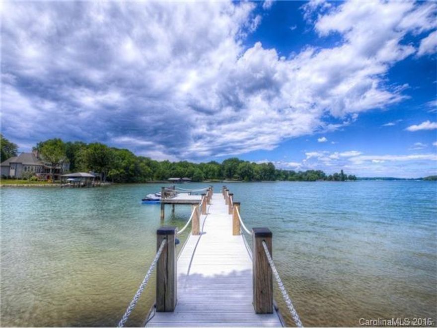 Voted by Charlotte Magazine as #2 most desirable suburb.Unbelievable curb appeal with drive thru drive and 5 car garage, Executive WF Home in TNGC of Charlotte, on Lake Norman in The Point.Simonini custom home, mstr retreat on main level.Open floor plan with gourmet kitchen/Viking App.Three bds up, w/en-suite baths, bonus rm & exceptional workout area w/custom features.Audio thruout.LL Media, Bar/Entertainment, Billiards Area, Cedar Closet, Office. Private Deeded Boat Slip, Pier, In ground pool.