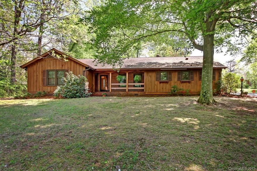 WELL BUILT CUSTOM THREE BEDROOM 2.5 BATH HOME SOLD WITH AN ADJOINING LOT. BOARD AND BATTEN CONSTRUCTION.  GREAT LOCATION NEAR CHURCHES,SHOPPING, TENNIS COURTS, HOSPITAL. WALKING DISTANCE TO HISTORIC DOWNTOWN STATESVILLE. OUTBUILDING WITH A CARPORT - WOULD MAKE A NICE WORKSHOP.
SHADED LOT WITH MATURE TREES AND LANDSCAPING. FENCED BACK YARD!