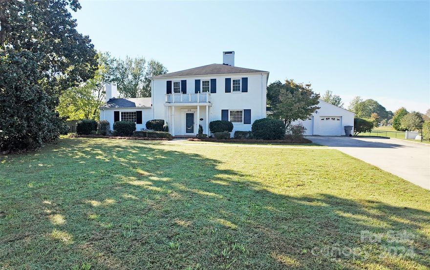 IN THE HEART OF CLOVER! Welcome to this stunning 2-story full brick home, offering 4 spacious bedrooms and 3.5 baths. The home boasts beautiful hardwood floors throughout, providing both style and durability. For added convenience, there's a second living space with a half bath, located behind the 2-car garage, perfect for guests or extra family members. The fenced backyard offers privacy, complete with a lovely screened room for outdoor enjoyment and a storage shed for your extra belongings. This home is perfect for those seeking charm, comfort, and versatility in one beautiful package!