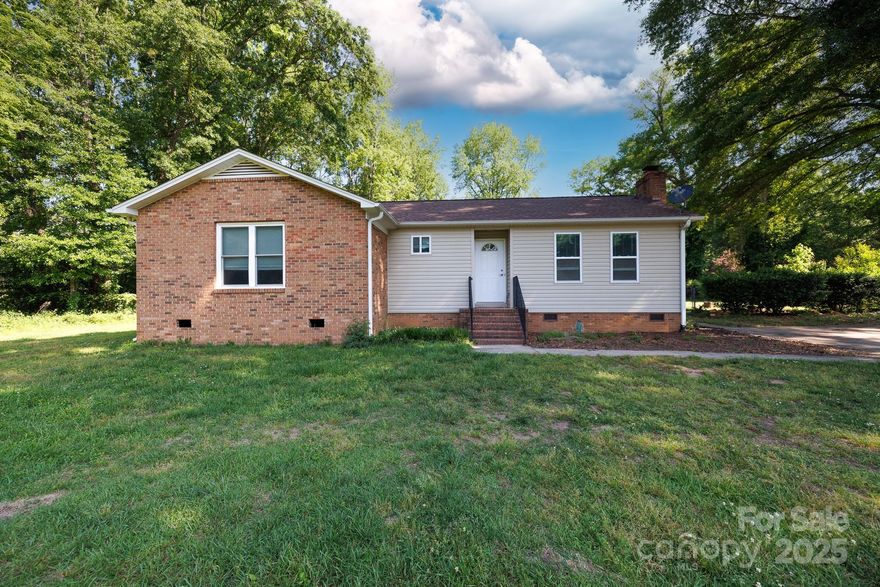 Discover the charm of this updated 3-bedroom, 2-bath ranch in Lakewood, nestled on 3 lots totaling 0.52 acres! The partial brick exterior enhances the curb appeal, while the open floorplan creates a welcoming and spacious feel. Gather around the cozy wood-burning fireplace in the living room, or enjoy meals in the bright kitchen with its convenient dining area. The primary bedroom offers plenty of storage with two closets. Step outside to relax on the deck, surrounded by a fenced yard with a handy storage shed. This property offers endless potential for investors or future homeowners alike. Don’t miss the chance to make it yours!