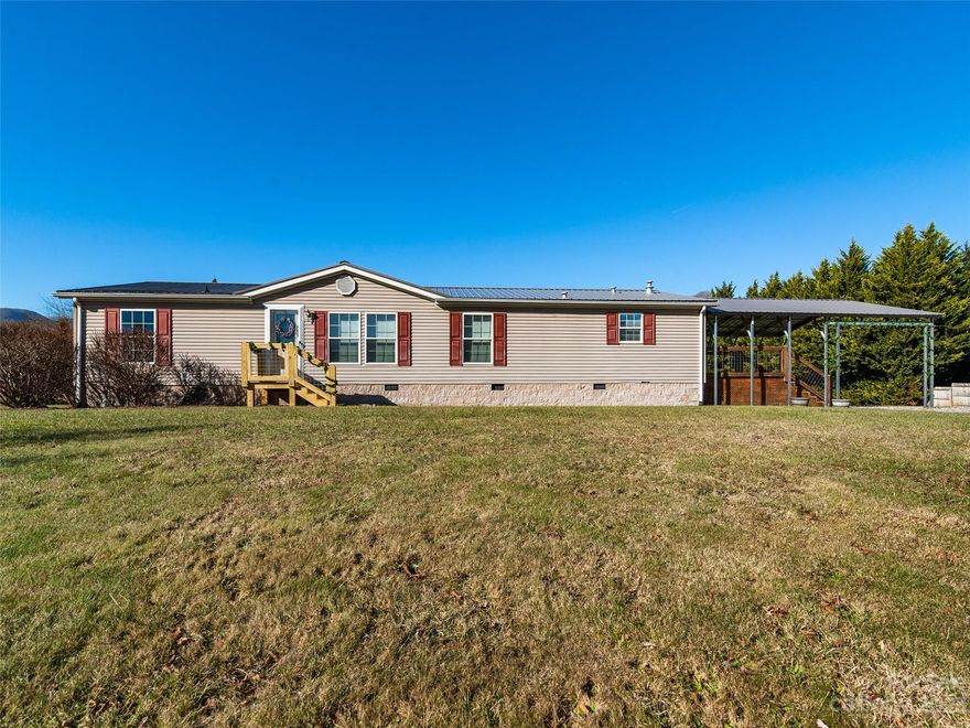 Wonderful location and setting with this three bedroom, two bath single level home with open floorplan, vaulted  ceilings, large primary suite, fantastic level yard, detached oversize single car garage all with updates such as metal  roof, central air & gas furnace, 18KW generac home generator, 8X40 rear deck and more...