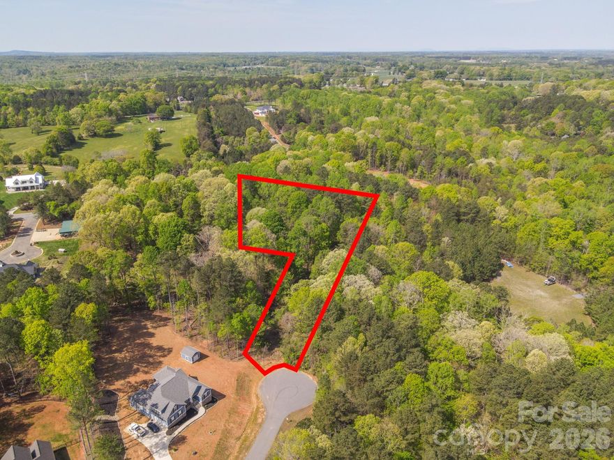 Great opportunity to own a beautiful 2.05-acre property in the town of Catawba, NC, located in Catawba County. Bring your builder and create your dream home. This peaceful community is near Lake Norman, offering a serene and scenic environment. The property is situated at the end of a cul-de-sac, easily accessible from Eric Crane Dr, and is conveniently located near various amenities and outdoor recreational opportunities. Zoned for Single-Family Residential use, the lot is managed by an HOA and has electricity available in the area, with an electrical distribution box located near the center of the property line.  The region also features parks and nature trails, ideal for outdoor activities like hiking and biking. Don't miss this opportunity to own a piece of Catawba!