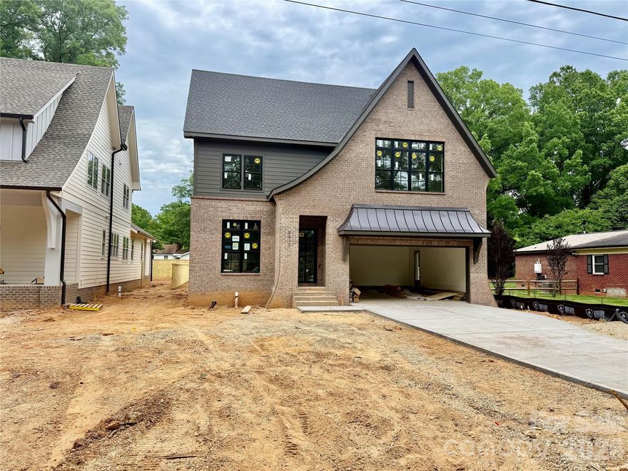 Schedule your showing today. Completion early June.  Luxury new construction in Cotswold built by THR Design Build. Stunning architectural details and custom finishes. Open concept on the main level 10 ft ceilings, vaulted ceilings, site finished white oak hardwood floors, indoor and outdoor Isokern masonry fireplaces, spacious primary suite, half BR, dropzone, and sliding doors lead from the great room out to the screened-in back porch. 5 bedrooms, 3.5 baths, 3,754 sf, and two car garage. Gorgeous gourmet chef's kitchen with quartz countertops, kitchen island, large working pantry, 36" KitchenAid refrigerator/freezer with internal water dispenser, a 36" KitchenAid dual fuel range, and a KitchenAid dishwasher, Zephyr under counter wine cellar, custom range hood, and Kohler farmhouse sink and microwave drawer in pantry. Upper level includes 9 foot ceilings, white oak hardwoods, four secondary bedrooms, a large laundry room with soaking sink and cabinets. Other features include quartz countertops, custom shelving in all closets, walk-in closets, solid core interior doors, and Pella oversized windows. Completely sealed and waterproofed crawl space, Rinnai tankless water heater, 2 Trane high-efficiency heat pumps, irrigation, fully sodded front and backyard, epoxy flooring in the garage, and 6 foot privacy fence.