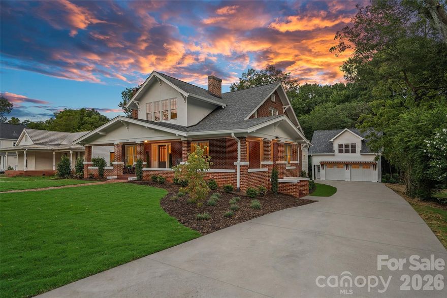 Experience the rare opportunity to own a piece of Davidson’s history right on Main Street in the heart of downtown. The iconic John Raymer House, Circa 1925, has been masterfully renewed blending timeless charm with modern sophistication. Original refinished hardwoods, an inviting wraparound porch and four fireplaces showcase its heritage, while the show stopping gourmet chef's kitchen with expansive island & scullery that flows seamlessly into the casual dining and spacious living room with vaulted ceiling anchors the home for today’s lifestyle. The main level also features a dedicated front office, formal dining room, drop zone and laundry, along with the primary retreat boasting its own fireplace, sitting room, spa-inspired bath & custom walk-in closet. Upstairs offers a loft and three spacious ensuite bedrooms. The finished walkout basement with full bath is ideal for guests or entertaining, and the detached garage with unfinished quarters above offers endless possibilities.