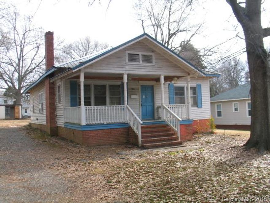 Lots of space & potential. Laminate flooring throughout expect kitchen and bath. Dining room could be 4th bedroom with minor changes. Spacious eat in kitchen. Nice size rooms throughout. Large covered front porch. Nice level lot. Bank owned property to convey by special warranty deed and in as is condition. Buyer / Buyer agent to verify all info and systems.