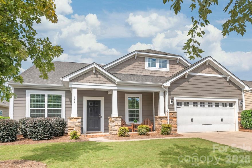 Welcome to 634 Gardenbrook Trail, located in the highly desirable Conservancy at McLean community just minutes from downtown Belmont. Enjoy convenient access to local shops, dining, community events, Stowe Botanical Gardens, the Carolina Thread Trail, and Lake Wylie. This move-in-ready home offers a sought-after main-level living floor plan with 4 bedrooms, a dedicated office, and an open-concept design ideal for everyday living and entertaining. The kitchen features espresso cabinetry, an oversized island, granite countertops, and a gas range, opening to the main living area. The primary suite is located on the main level and includes dual vanities, a tiled shower, and a large walk-in closet. Three additional bedrooms on the main level are thoughtfully positioned for privacy. Upstairs, you’ll find a spacious bonus room and flex space with a full bath, offering options for a media room, guest suite, or additional living area. The HOA includes lawn mowing, edging, and seasonal pine needle maintenance, allowing for low-maintenance living. Community amenities include a pool, fitness center, dog park, and direct access to nature trails. A great opportunity to enjoy comfort, convenience, and community in one of Belmont’s most sought-after neighborhoods.