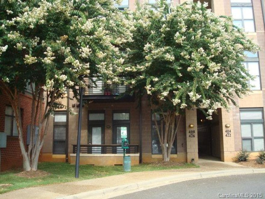 End Unit with an open floor plan, freshly painted, new hardwood flooring & new carpet!  10' ceilings, recessed lighting in kitchen including large pantry & nicely sized side-by-side refrigerator.  Master Bedrm is complete w/new carpet, ceramic tile in the bathrm, large master closet & access to the private balcony.  Washer/Dryer & Refrigerator to remain!  Convenient to New Bern Station Light Rail, restaurants, shopping & much more. Minutes from Uptown, Dilworth & the booming South End area.