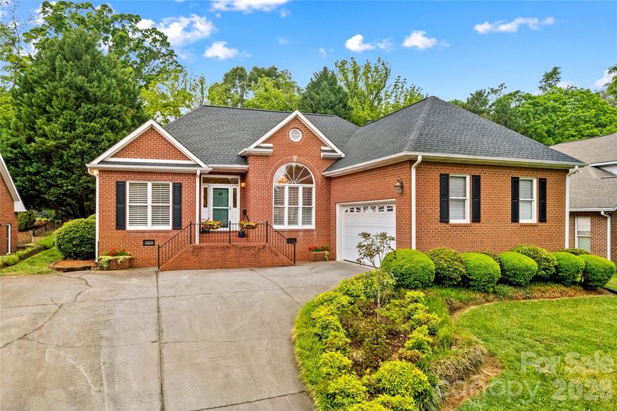 Beautifully maintained and renovated, this one-level home is in a vibrant neighborhood within walking distance of charming downtown Statesville, NC, as well as pickleball and tennis courts. Full of character, it boasts abundant natural light, a marble natural gas fireplace in the spacious living room, crown molding, new cabinetry, gorgeous plantation shutters, blinds, and solar shades in the cozy sunroom overlooking the meticulously landscaped, partially fenced backyard. Features include refinished original hardwood floors, new gas-pac HVAC, 12-foot ceilings in the dining room, new ceiling fans and fixtures, fresh paint, upgraded hardware, tiled wet areas, and a newly remodeled kitchen with premium KitchenAid appliances & sunny breakfast nook. The split-bedroom floor plan features a spacious master suite with a full bath, walk-in closet, and room to add a tub or customize to your liking. Conveniently located near shopping and dining, this single-level, low-maintenance home is perfect for entertaining in the backyard, with plenty of space for dining inside and out, fresh landscaping, grilling area, and more. It’s the ideal mix of comfort and convenience.