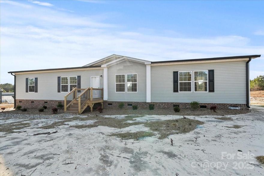 Charming Country Living on 1+ Acre — 3 Bedroom, 2 Bath Home with Second Family Room!
Welcome to 5257 Raleys Mill Road, a spacious and inviting 3-bed, 2-bath home ideally situated on a 1.06-acre parcel in peaceful Bethune, SC. Boasting approximately 1,920 sq ft of living space, this well-designed residence features a desirable split bedroom floor plan that offers privacy and comfort for all.  Updated with new stove, refrigerator and dishwasher.  Has new heat pump and furnace.  Brand new flooring, ceiling fans and toilets.  New brick skirting with composite decking.  Fresh paint throughout. Step inside to a bright and open layout with plenty of room for everyday living and entertaining. A second family room provides flexible space — perfect for a home office, playroom, media room, or formal living area. The generous kitchen serves as the heart of the home and flows easily into adjacent living spaces.
The primary suite is tucked away for added privacy and includes an ensuite bath, while two additional bedrooms and a second full bath complete the thoughtful floor plan. Outside, enjoy peaceful country living with ample yard space on over an acre — perfect for gardening, outdoor activities, or future expansion.
Conveniently located near schools, local amenities, and scenic rural roads, this property offers the perfect combination of space, comfort, and Southern charm.
Don’t miss your chance to make this lovely home your own!