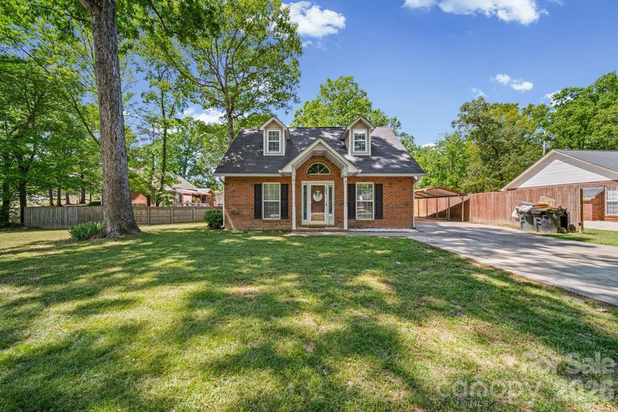 Convenient to everything! Three bedroom brick home in established neighborhood just minutes from shopping, grocery stores, hospital, Indian Trail and beautiful downtown Monroe. Primary bedroom and bath on main level with separate garden tub and shower. Two bedrooms and bath upstairs. Granite countertops, back porch and more.