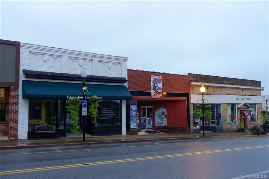 4 Store fronts on Main St. Fort Mill - buildings, not businesses for sale. 8000 Sq. Ft. of retail/office space on high traffic area. Public parking at rear of buildings and front street parking. All currently rented on a month to month basis - rental schedule available upon request. Over a half acre of space in area of high demand - vibrant area near restaurants and upscale retail. Owner may consider breaking up parcel depending on terms