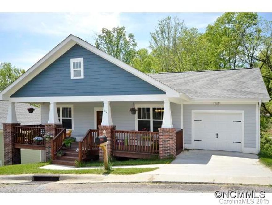 Nearly new Arts & Crafts home with 3 bedrooms and 2 full baths. Open floor plan with 9 ft ceilings, fully equipped kitchen, upgraded cabinets, breakfast bar, indoor laundry, tile floor in bathrooms with bidet in master bathroom.  Beautiful Brazilian cherry hardwood floors throughout. Enjoy the great mountain views from the large covered front porch. 1 car garage w/ opener. Home Warranty. Located only minutes from Asheville and Black Mountain.