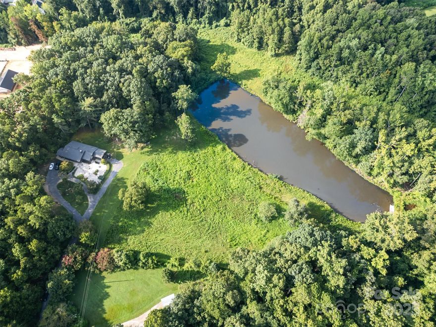 Impossible opportunity to find on the open market! Located just 15 minutes from Uptown Charlotte, this remarkable property spans over 12 acres across two parcels. Enjoy the tranquility of nature with this property’s scenic views, wildlife and a pond, perfect for fishing and entertaining. An existing structure on-site will remain, sold as-is, where-is. Seller will not make repairs, as the value is primarily in the land itself. Unique opportunity to acquire a substantial parcel close to uptown, ideal for residential development, recreational use or investment. No Showings without contracting agent to schedule. Property is sellers primary residents. Please be mindful and respectfully of there privacy.  Also listed as Residential under MLS# 4293590. Call agent for additional information.